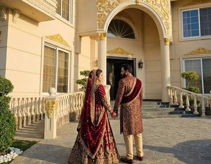 Bride and groom posing outside AH Royal Resort during a luxury bridal photoshoot for a wedding album