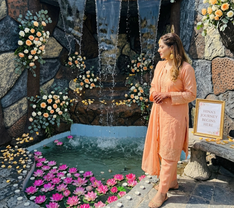 Elegant waterfall and floral décor setup at AH Royal Resort, a luxury small event venue in Islamabad for private celebrations