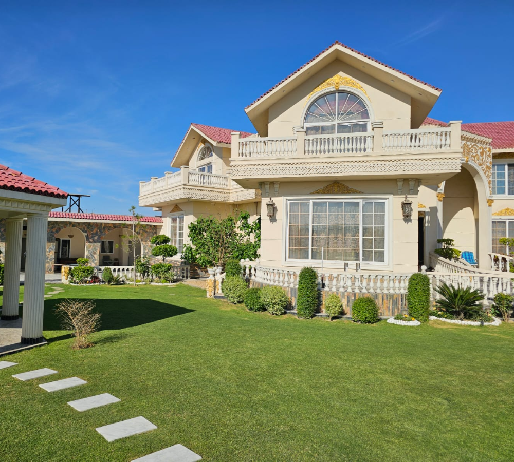 Private nikkah venue near Islamabad with luxury farmhouse, landscaped garden, and outdoor seating area for intimate ceremonies